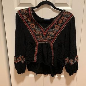 Black Shirt with Intricate Design.
